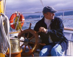 Photo of man on sailboat